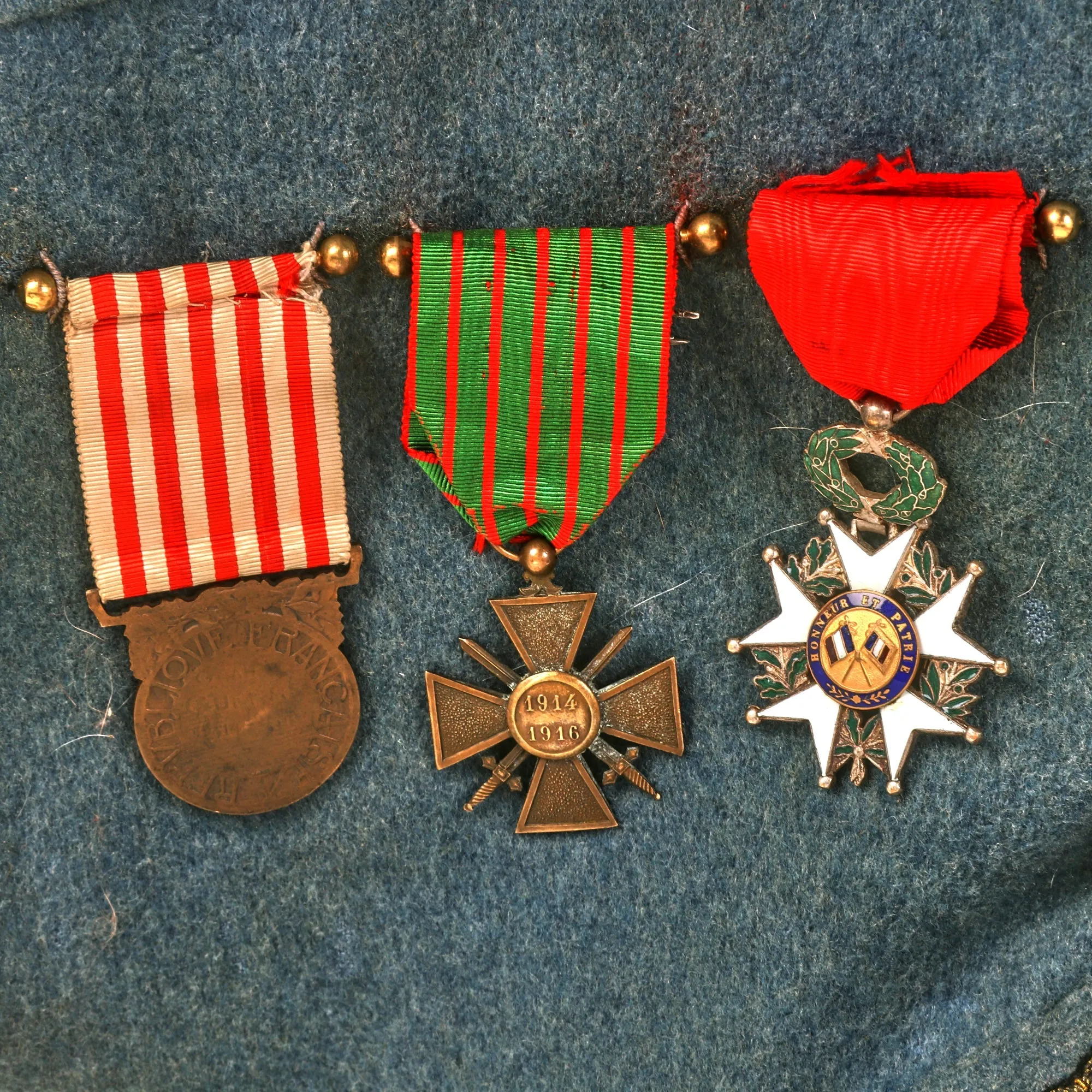 Original France WWI Pilot Armée de l'Air French Air Service Wounded Commandant Officer’s Uniform Set With Tunic, Trousers, Sam Browne Belt, Medals, and Overseas Cap with Squadron Insignia - 'Stork Escadrille N3'