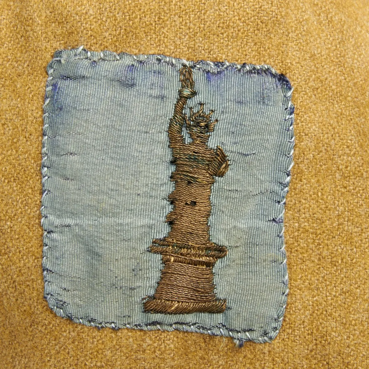 Original U.S. WWI Lost Battalion 77th Liberty Division Collection - Tunic and Helmet